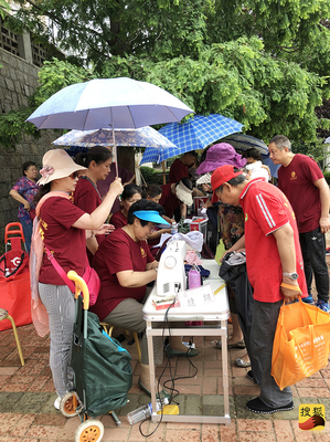 家门口享受18项星级服务 金门路街道4S党员志愿服务直通车进社区一周年活动